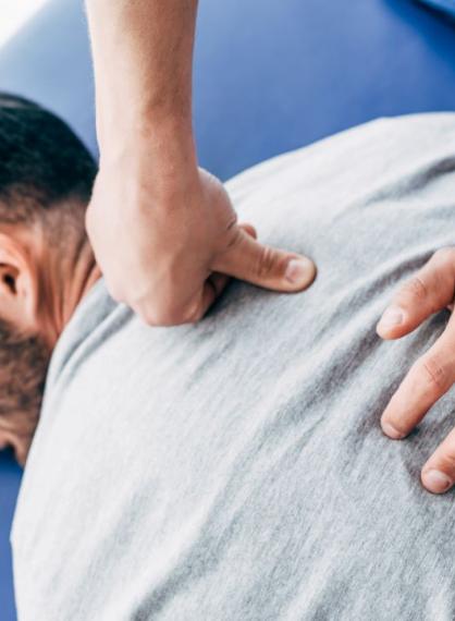 Man receiving shoulder massage